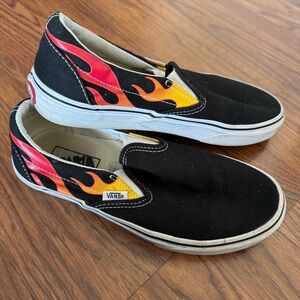 Vans Black Slip-Ons with Red and Yellow Flame Pattern